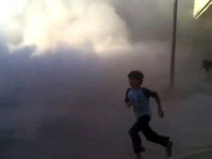 This frame grab made from amateur video provided by Syrian activists on Monday, May 28, 2012, purports to show the massacre in Houla on May 25, 2012, which killed more than 100 people, many of them children. (AP Photo/Amateur Video via AP video)