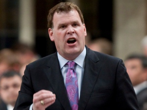 Foreign Affairs Minister John Baird rises during Question Period in the House of Commons on Parliament Hill in Ottawa, Monday, May 28, 2012. (THE CANADIAN PRESS/Adrian Wyld)