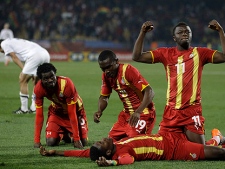 Ghana players celebrate following the World Cup round of 16 soccer match between the United States and Ghana at Royal Bafokeng Stadium in Rustenburg, South Africa, on Saturday, June 26, 2010. (AP Photo/Guillermo Arias)