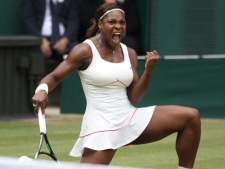 Defending champion Serena Williams reacts as she wins a point from Vera Zonareva, during the women's singles final on the Centre Court at the All England Lawn Tennis Championships at Wimbledon, Saturday, July 3, 2010. (Jon Super/AP Photo)