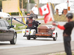 Bob Probert's casket leaves Windsor Christian Fellowship church in Windsor, Ontario on Friday, July 9, 2010 following the former Detroit Red Wings enforcer's funeral after his sudden death earlier this week at the age of 45. (THE CANADIAN PRESS/Geoff Robins)