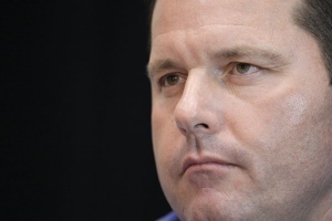 Roger Clemens listens to an audio tape played during a news conference about alleged steroid use on Monday, Jan. 7, 2008 in Houston, Texas. (AP / David J. Phillip) 