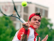 Milos Raonic  of Canada hits a forehand to Victor Hanescu of Romania in Rogers Cup ATP tennis action in Toronto on Monday August 9, 2010. (THE CANADIAN PRESS/Frank Gunn)