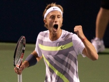 Peter Polansky of Canada pumps his fist after defeating Jurgen Melzer of Austria in Rogers Cup ATP tennis action in Toronto on Monday, Aug. 9, 2010. 