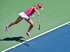 Victoria Azarenka from Belarus serves to Li Na from China during the round of sixteen at the Rogers Cup tennis tournament Thursday, August 19, 2010 in Montreal. Azarenka won 6-3, 6-3. (THE CANADIAN PRESS/Paul Chiasson)