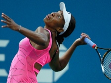 Venus Williams  of the United States, prepares to serve to Francesca Schiavone of Italy, during a quarterfinal match at the U.S. Open tennis tournament in New York, Tuesday, Sept. 7, 2010. (AP Photo/Charles Krupa)