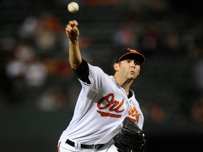 June 15, 2011 - Toronto, Ontario, Canada - Baltimore Orioles pitcher Jake  Arrieta (34) winds up during Wednesday nights game against the Toronto Blue  Jays at Rogers Centre in Toronto. The Toronto