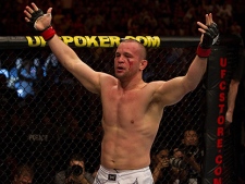 Welterweight Chris (Lights Out) Lytle celebrates his UFC 110 win over Brian Foster on Feb. 20, 2010 in Sydney, Australia. (THE CANADIAN PRESS/ho-UFC-Josh Hedges)